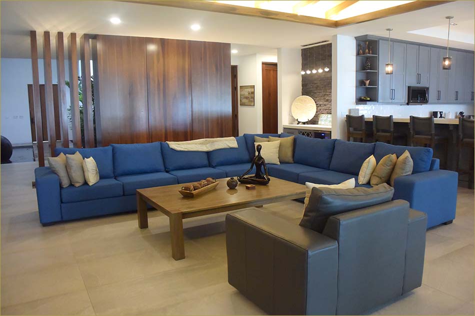 A large and comfortable sectional sofa facing the Pacific Ocean and the best waves in Costa Rica.